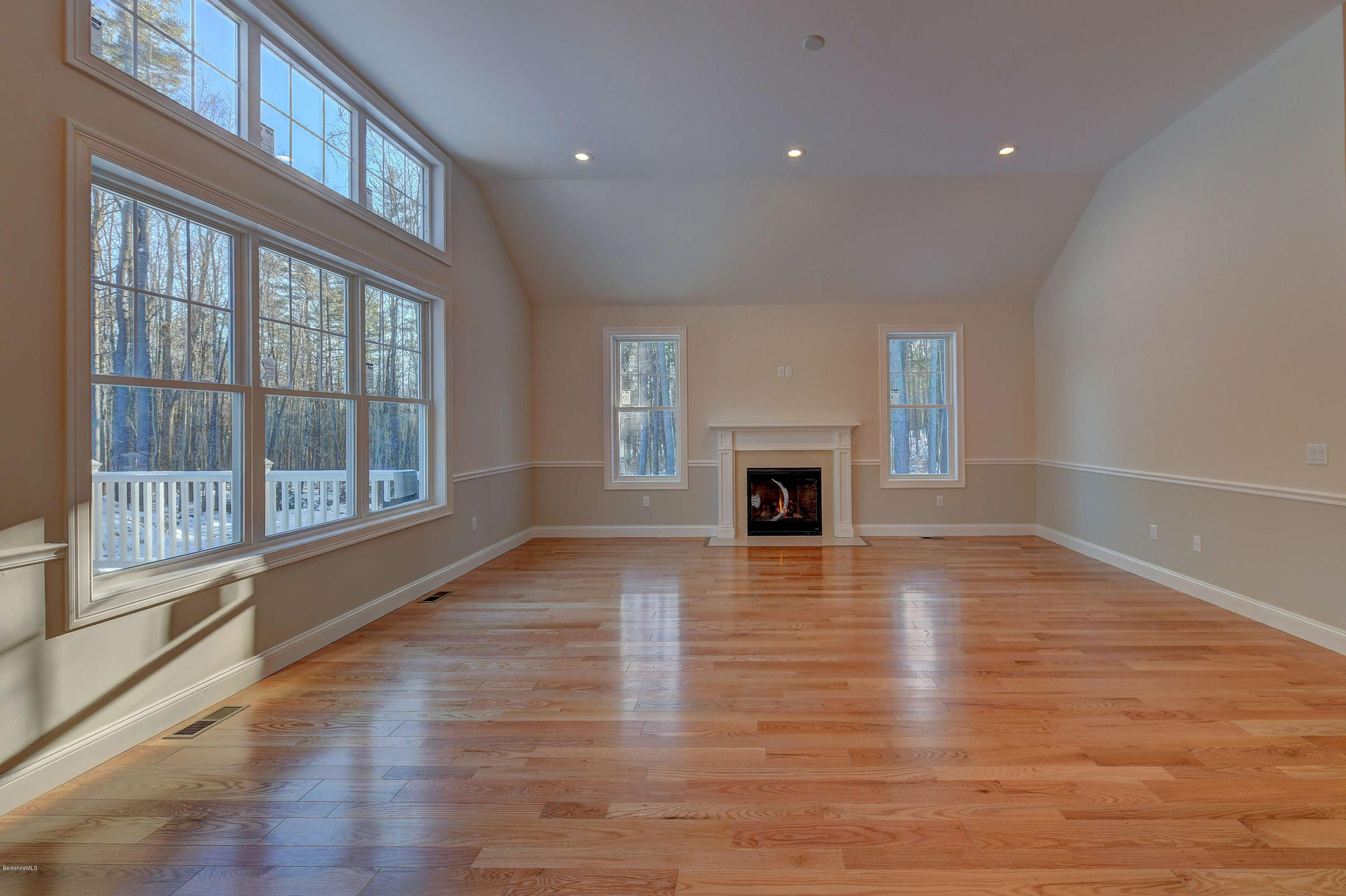 1 B West Dale Road Stockbridge, MA 01262 - Photo 5 of 26 a view of an empty room with wooden floor and a window