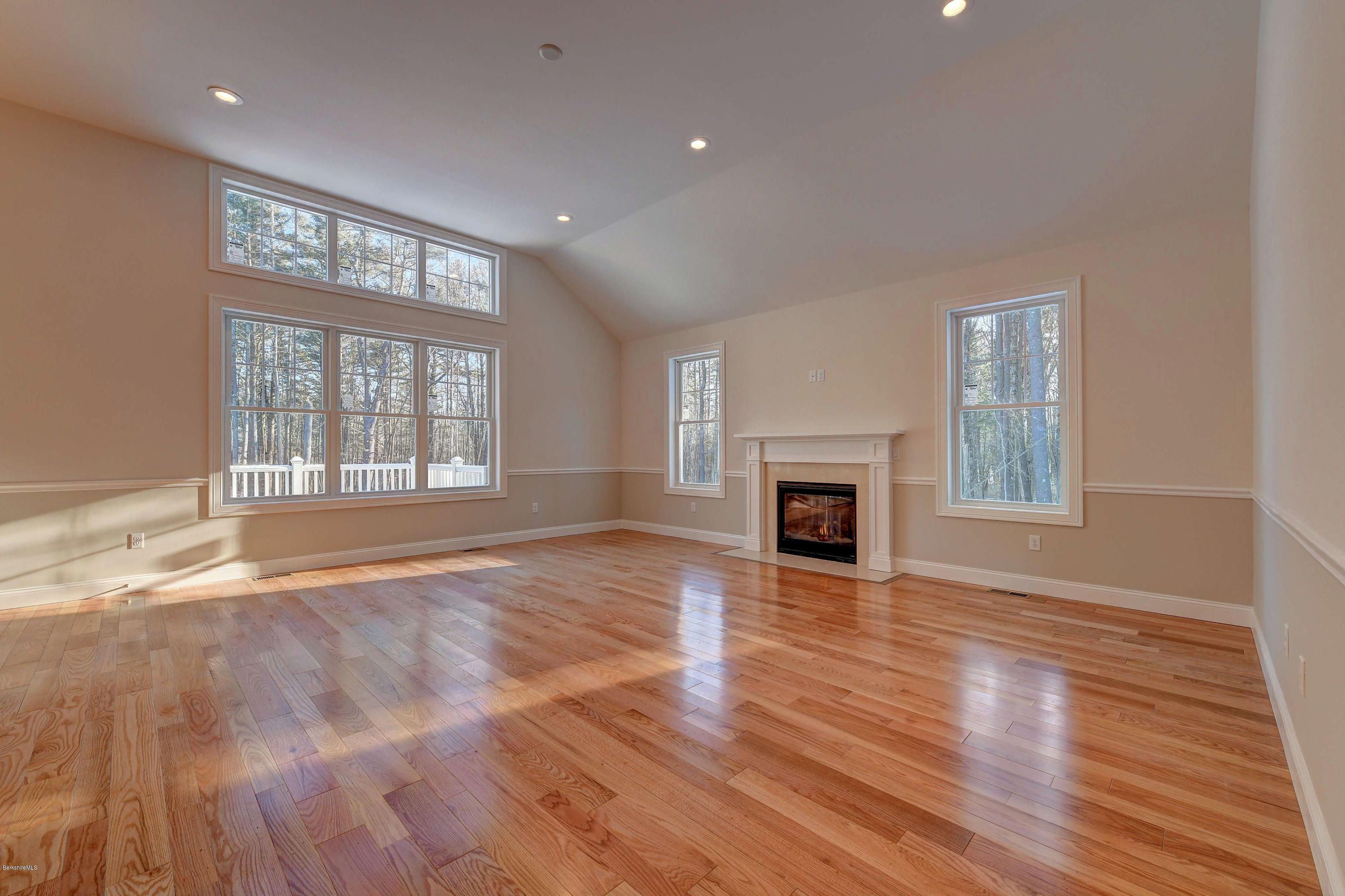 1 B West Dale Road Stockbridge, MA 01262 - Photo 6 of 26 a view of an empty room with wooden floor and a window
