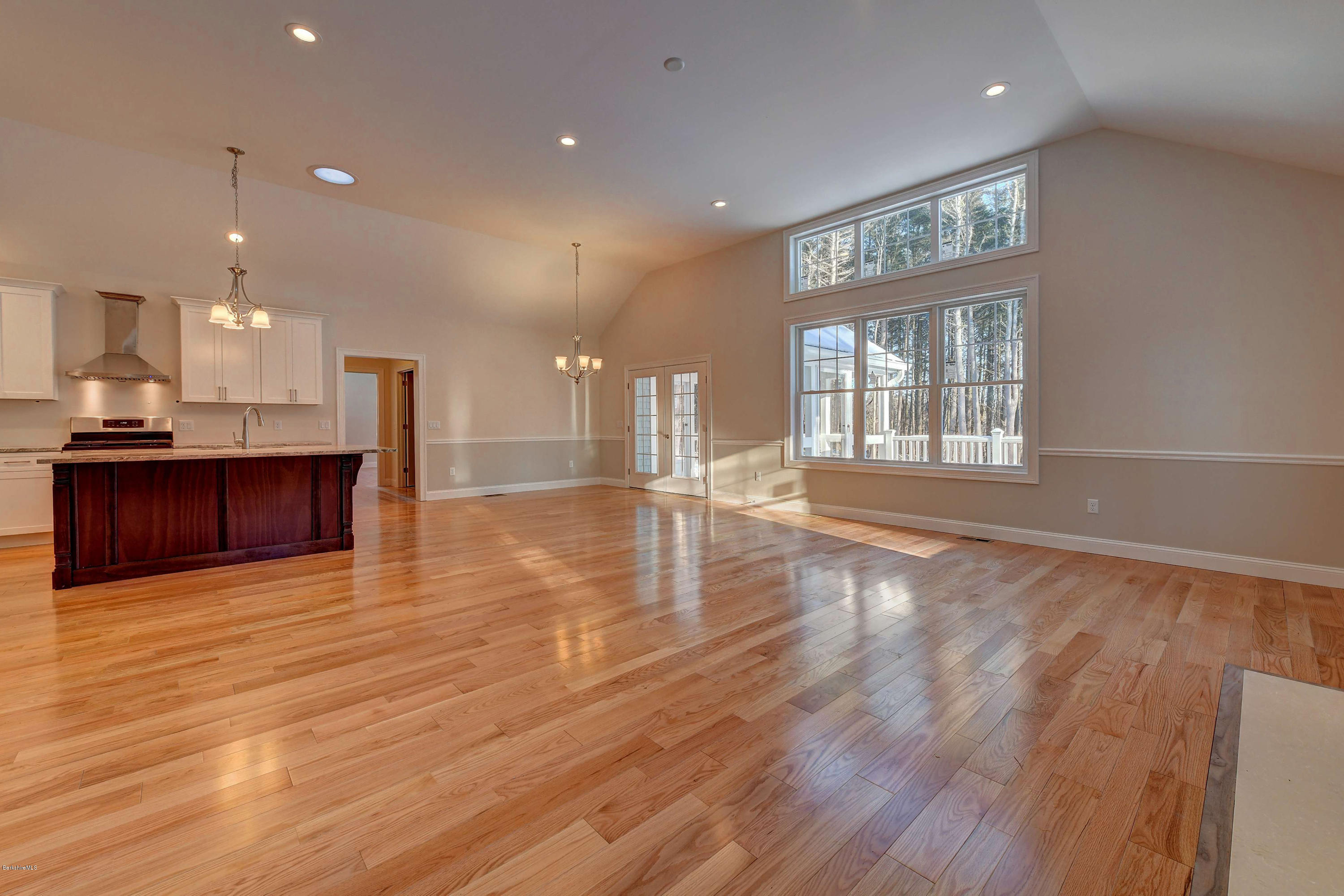 1 B West Dale Road Stockbridge, MA 01262 - Photo 7 of 26 a view of an empty room with wooden floor and a window