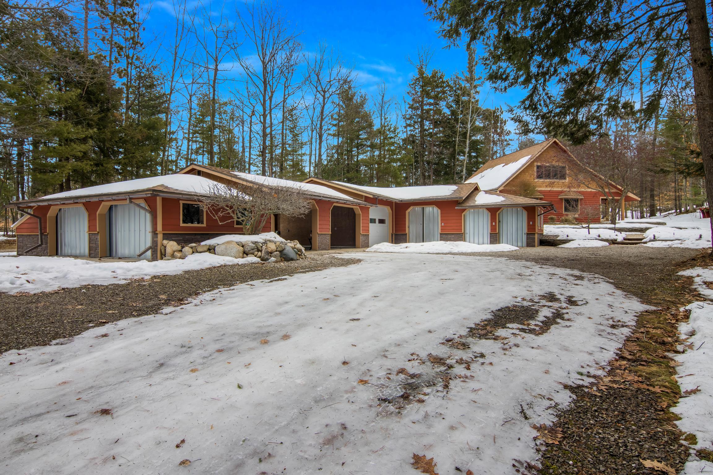 8162 Skegemog Point Road Williamsburg, MI 49690 - Photo 3 of 68