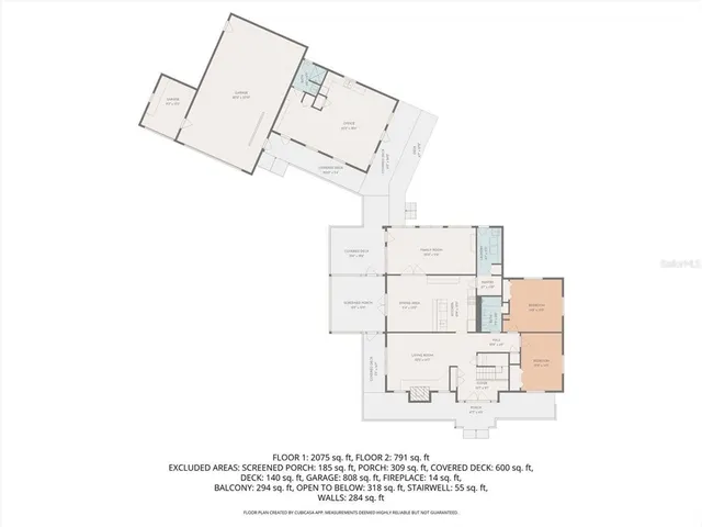 a kitchen with stainless steel appliances granite countertop a table chairs and a refrigerator