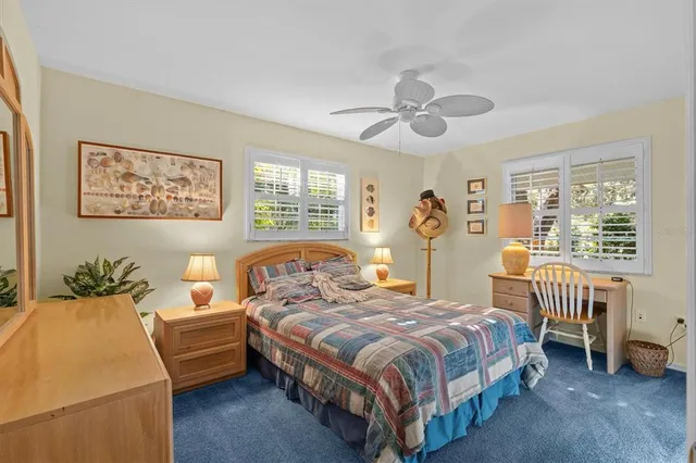 a kitchen with stainless steel appliances white cabinets and a sink
