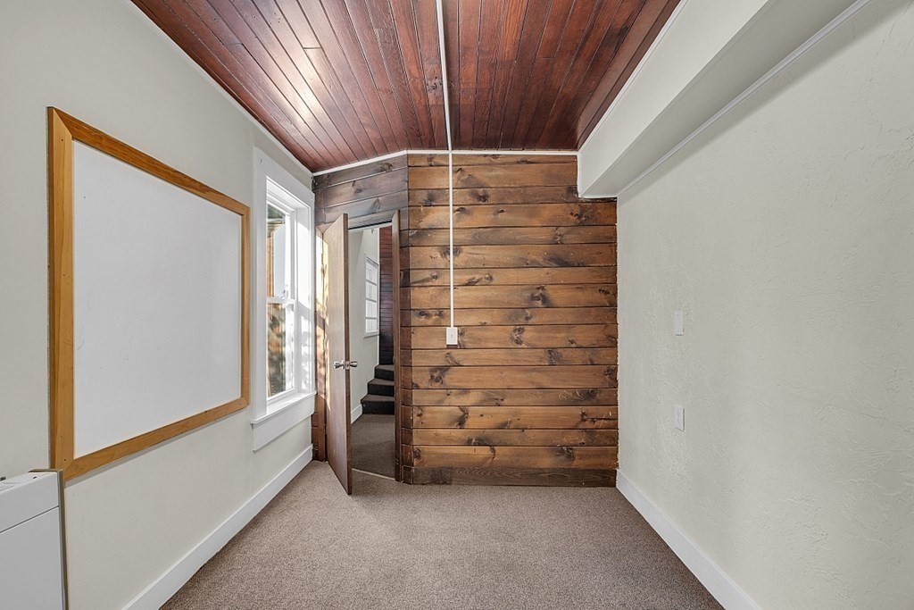 51 A Cedar Street Worcester, MA 01609 - Photo 14 of 27 a view of walk in closet with empty racks