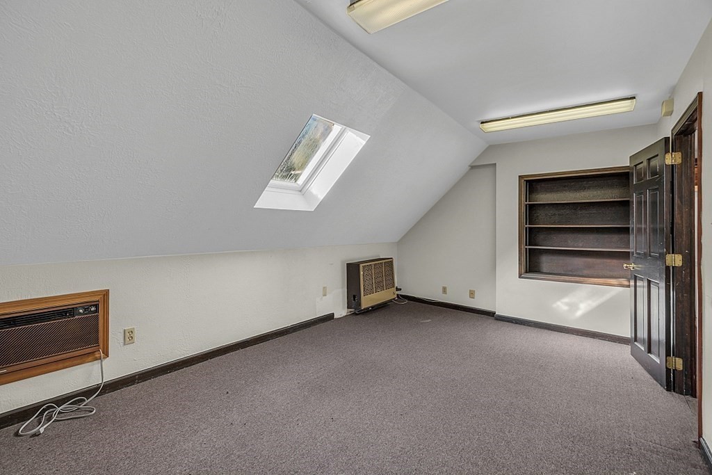 51 A Cedar Street Worcester, MA 01609 - Photo 23 of 27 a view of an empty room with a window