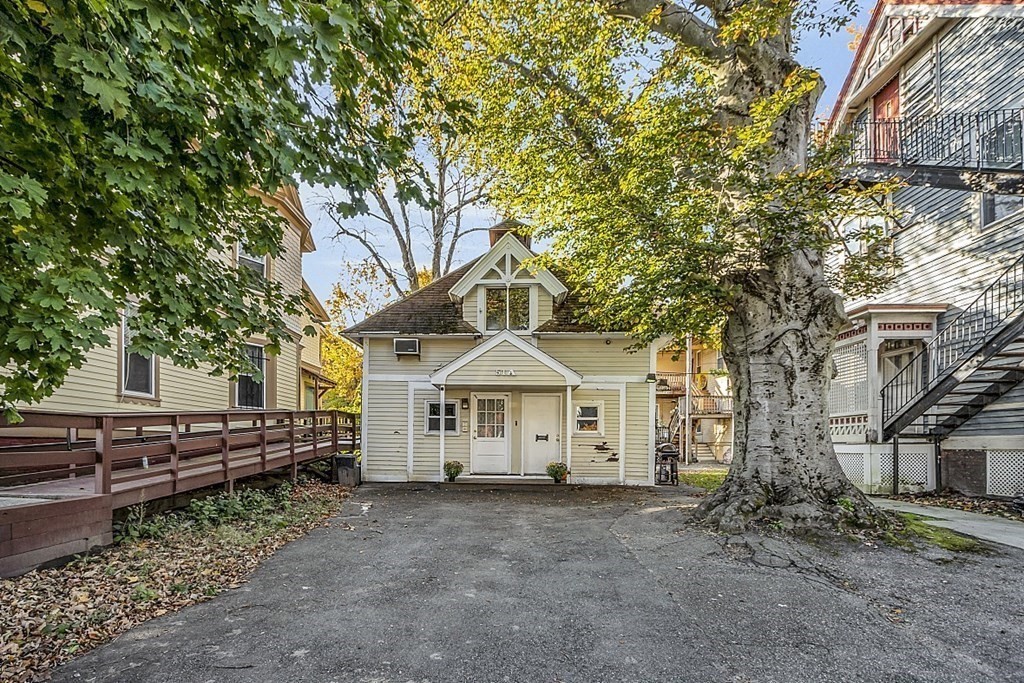 51 A Cedar Street Worcester, MA 01609 - Photo 27 of 27 a view of house with a tree in front of it