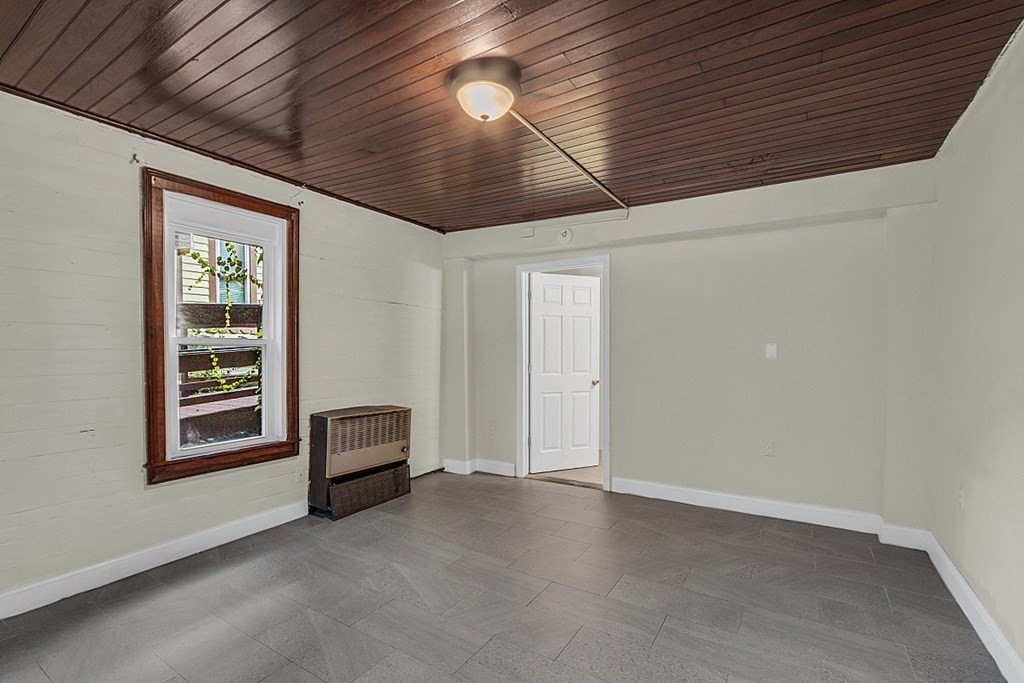 51 A Cedar Street Worcester, MA 01609 - Photo 3 of 27 an empty room with windows
