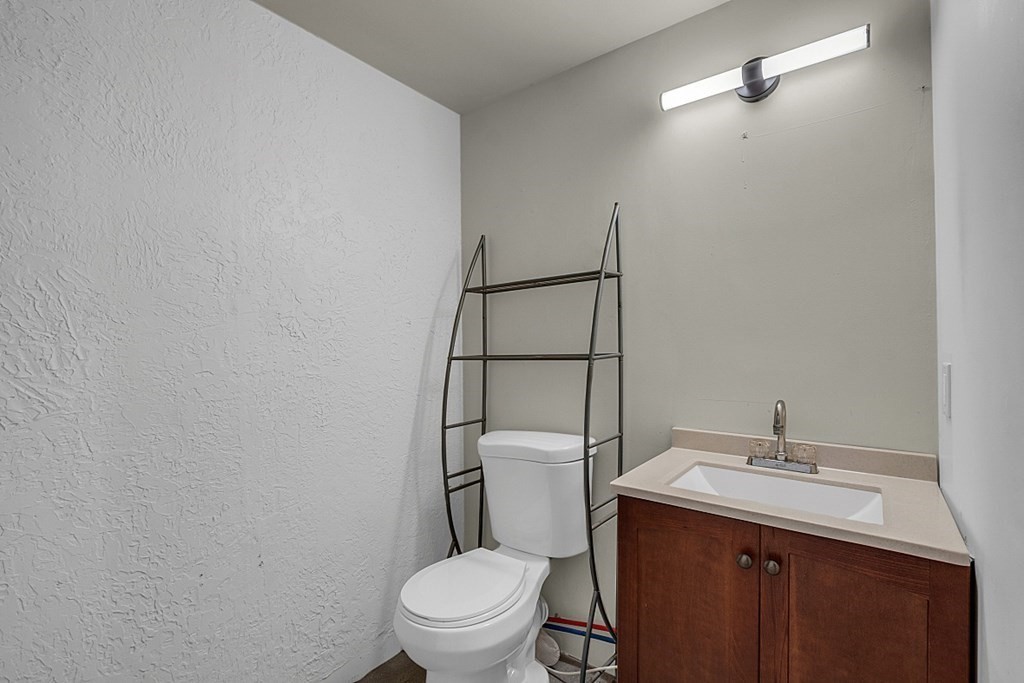 51 A Cedar Street Worcester, MA 01609 - Photo 6 of 27 a bathroom with a toilet a sink and mirror