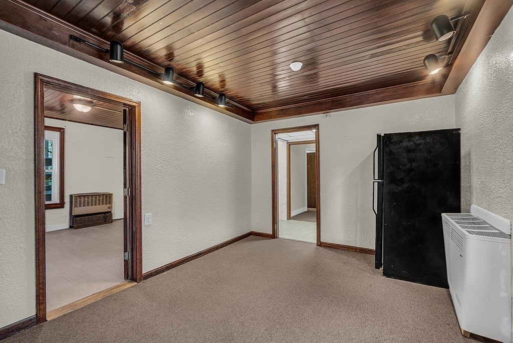 51 A Cedar Street Worcester, MA 01609 - Photo 8 of 27 a view of a hallway with wooden shelves