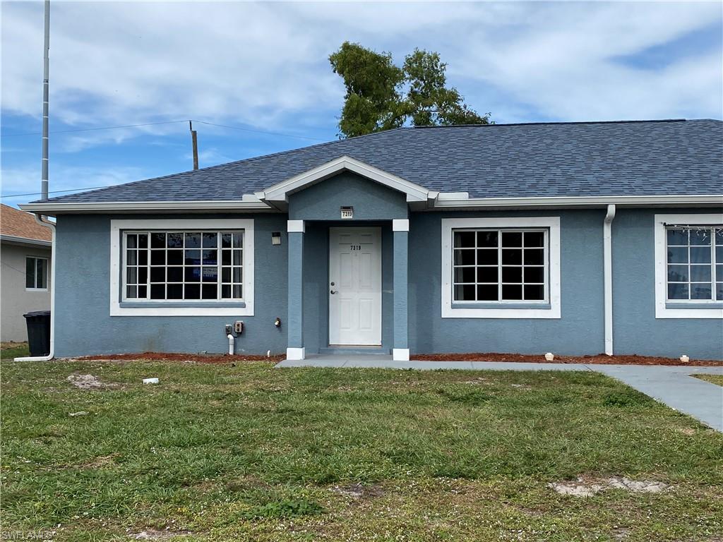 7319 Albany Road Fort Myers, FL 33967 - Photo 3 of 27 a house with trees in the background