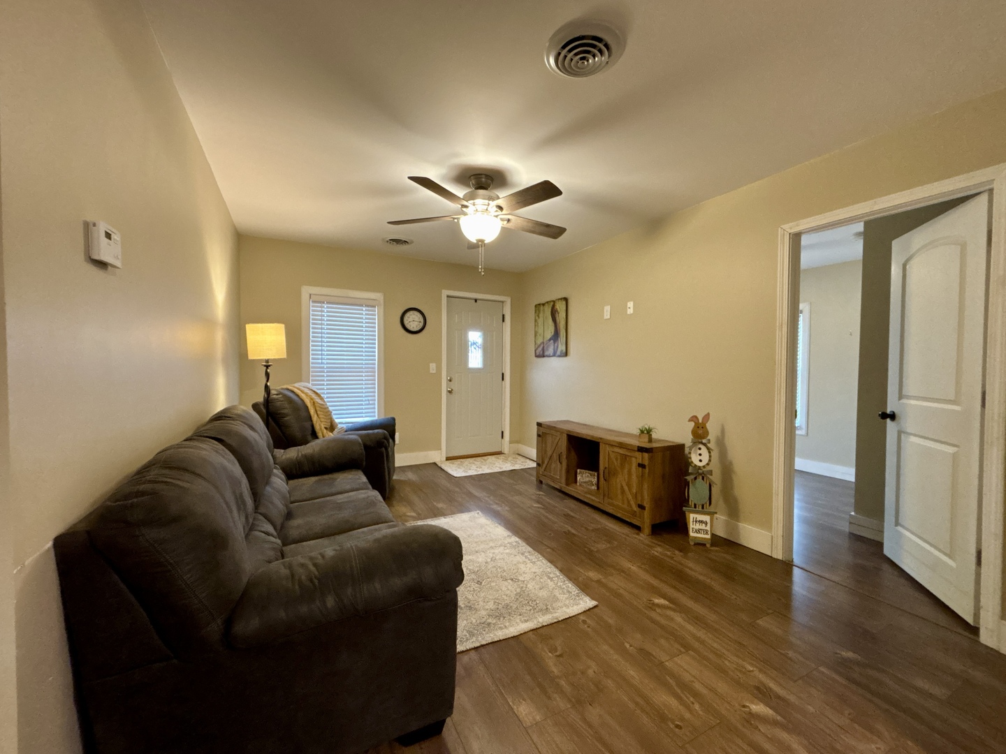 1187 Catherine Street Ottawa, IL 61350 - Photo 12 of 19 a living room with furniture and a chandelier