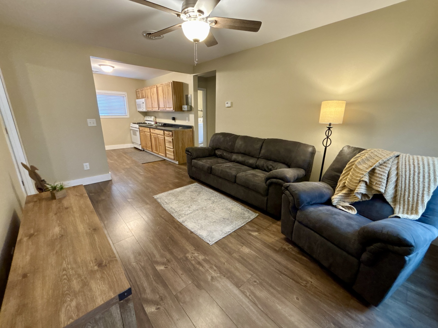 1187 Catherine Street Ottawa, IL 61350 - Photo 13 of 19 a living room with furniture and a chandelier