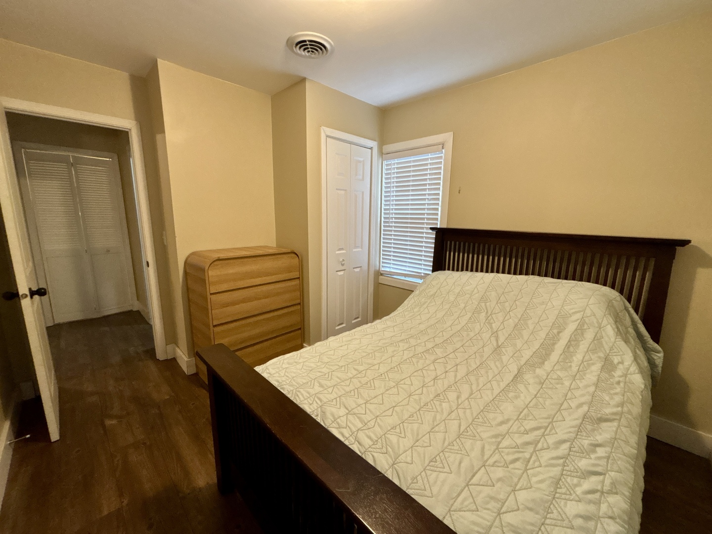 1187 Catherine Street Ottawa, IL 61350 - Photo 17 of 19 a bedroom with a bed and wooden floor