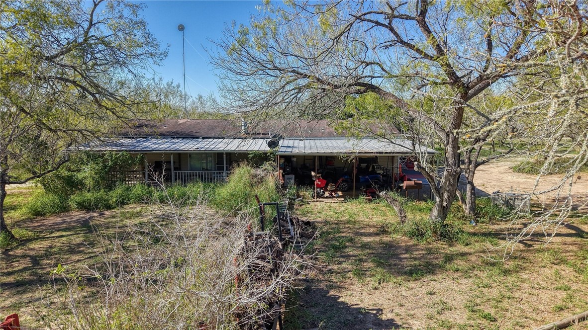 5730 Mockingbird Lane Mathis, TX 78368 - Photo 11 of 40 a view of a house with a yard