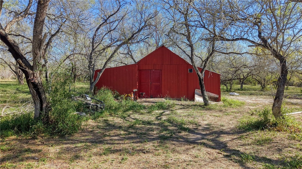 5730 Mockingbird Lane Mathis, TX 78368 - Photo 12 of 40 a view of a backyard of the house