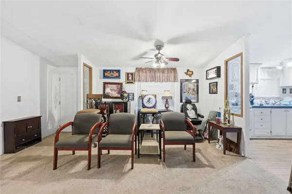 a room with furniture and chandelier