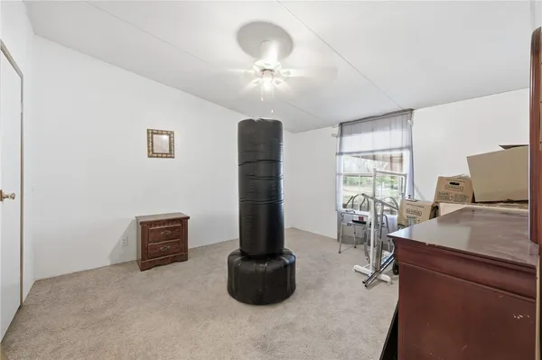 a view of storage and utility room with washer and dryer