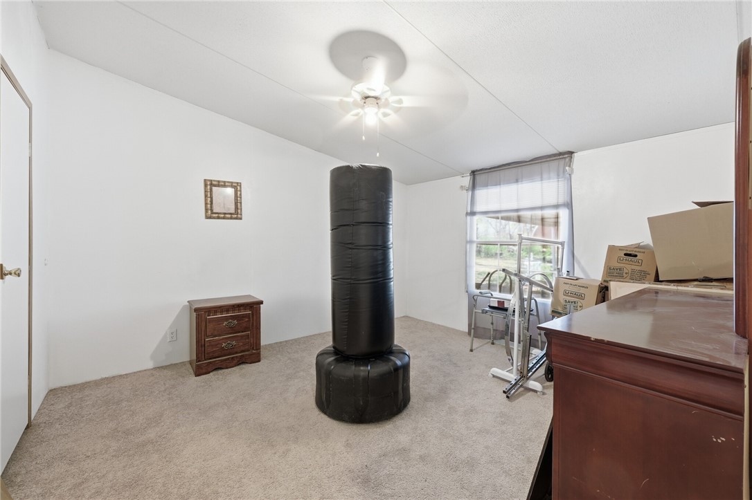 5730 Mockingbird Lane Mathis, TX 78368 - Photo 25 of 40 a room with furniture and chandelier