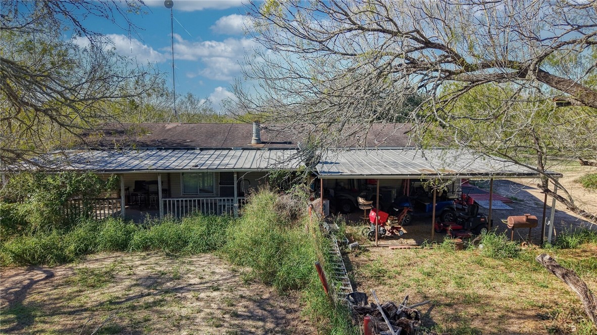 5730 Mockingbird Lane Mathis, TX 78368 - Photo 27 of 40 a view of a chairs and table in the backyard