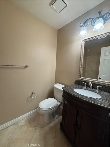a white bath tub sitting next to a shower