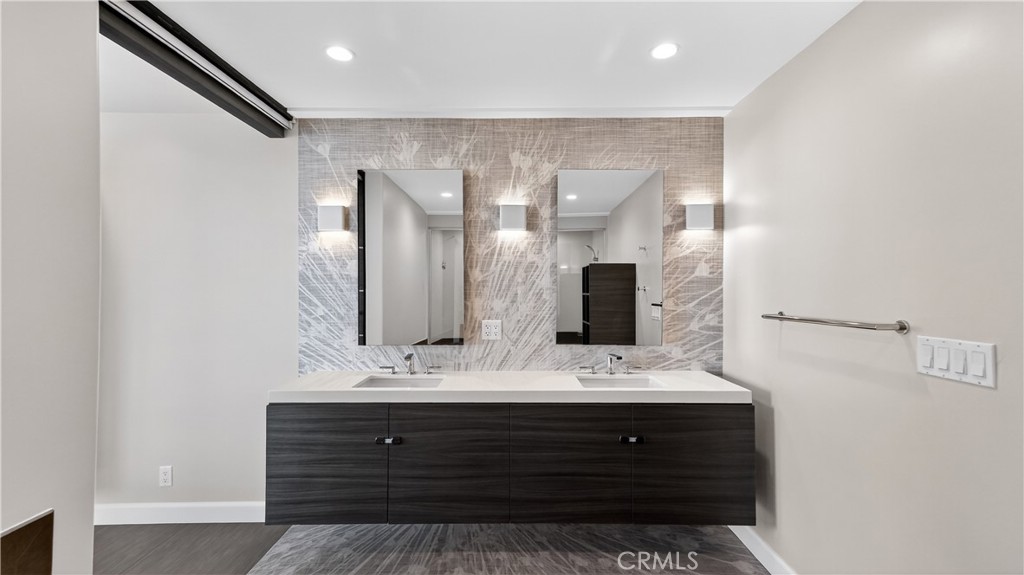 855 Santa Ana Street Laguna Beach, CA 92651 - Photo 17 of 35 a bathroom with a sink double vanity and a mirror