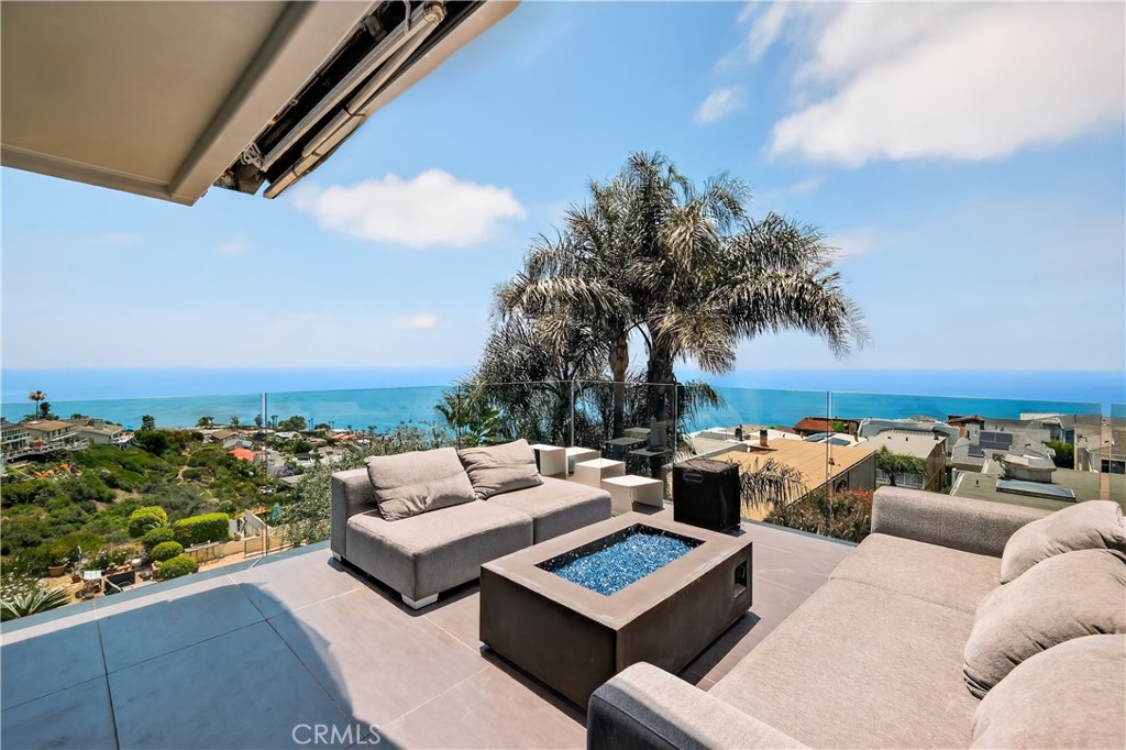 855 Santa Ana Street Laguna Beach, CA 92651 - Photo 24 of 35 a view of a terrace with couches and city view
