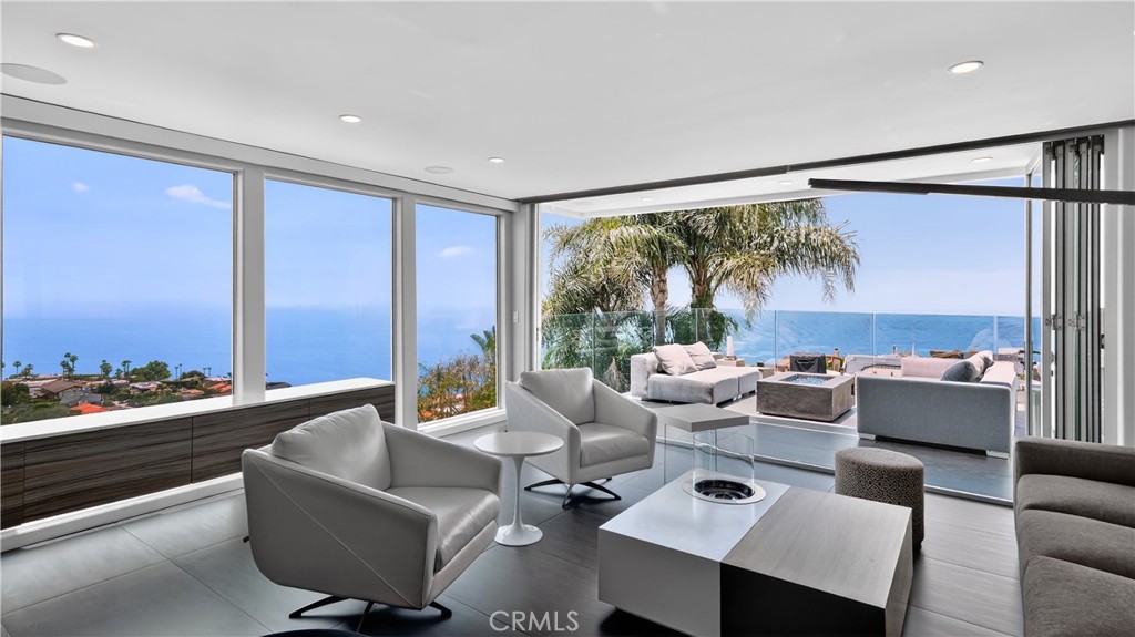 855 Santa Ana Street Laguna Beach, CA 92651 - Photo 6 of 35 a living room with furniture and a large window