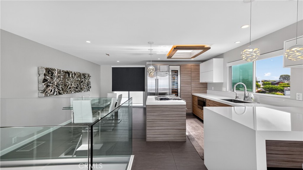 855 Santa Ana Street Laguna Beach, CA 92651 - Photo 8 of 35 a large white kitchen with a large window