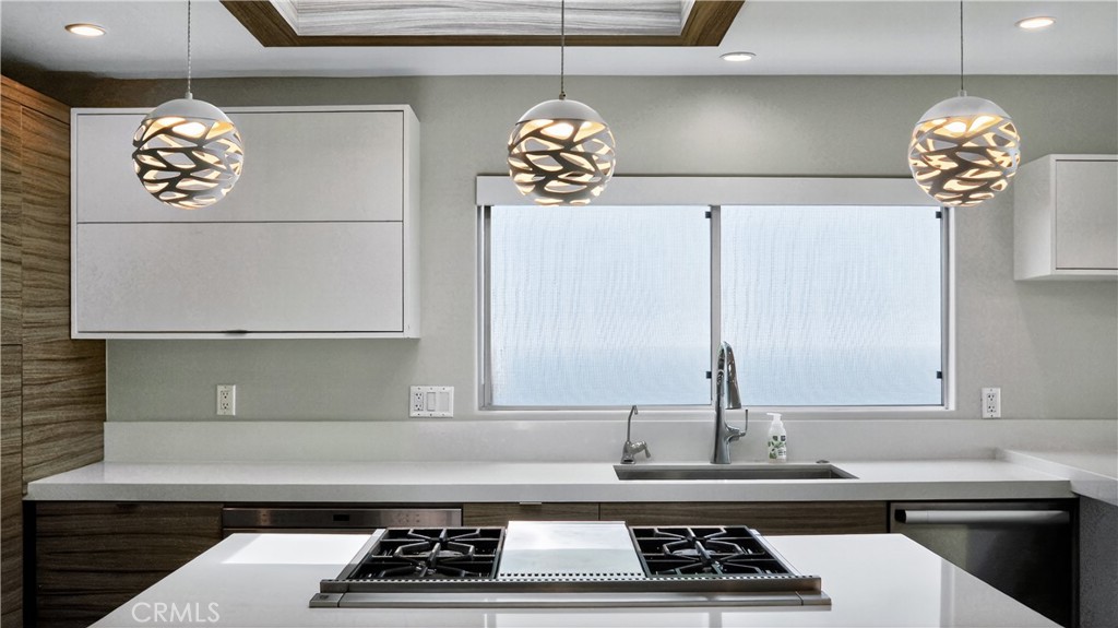 855 Santa Ana Street Laguna Beach, CA 92651 - Photo 10 of 35 a kitchen with a sink and a stove