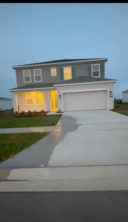 258 Puma Loop Groveland, FL 34736 - Photo 1 of 2 a view of a house with a swimming pool