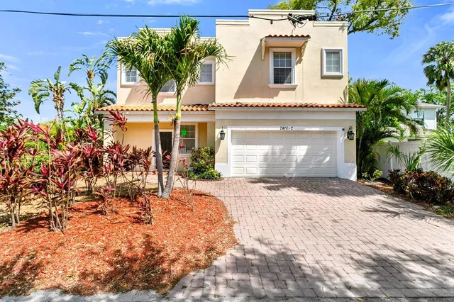 front view of a house with a yard