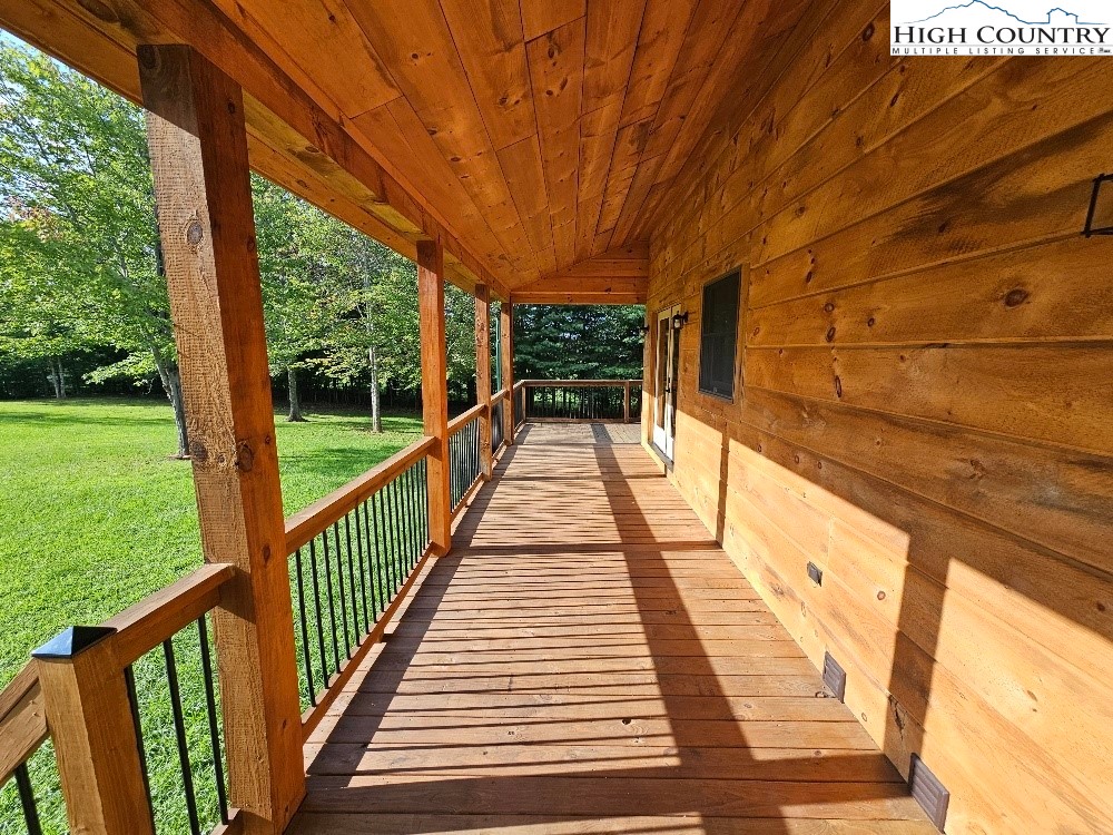 184 Presnell Road Sparta, NC 28675 - Photo 8 of 30 a view of balcony with wooden floor