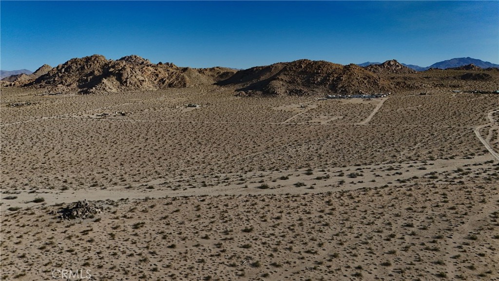 764 Rabbit Springs Road Lucerne Valley, CA 92356 - Photo 5 of 7 Red boundary lines on pictures are an estimate and for marketing purposes only. Buyer to verify all aspects of this property including, but not limited to utilities, assessments, boundaries, usage, access, and zoning to satisfy themselves.
