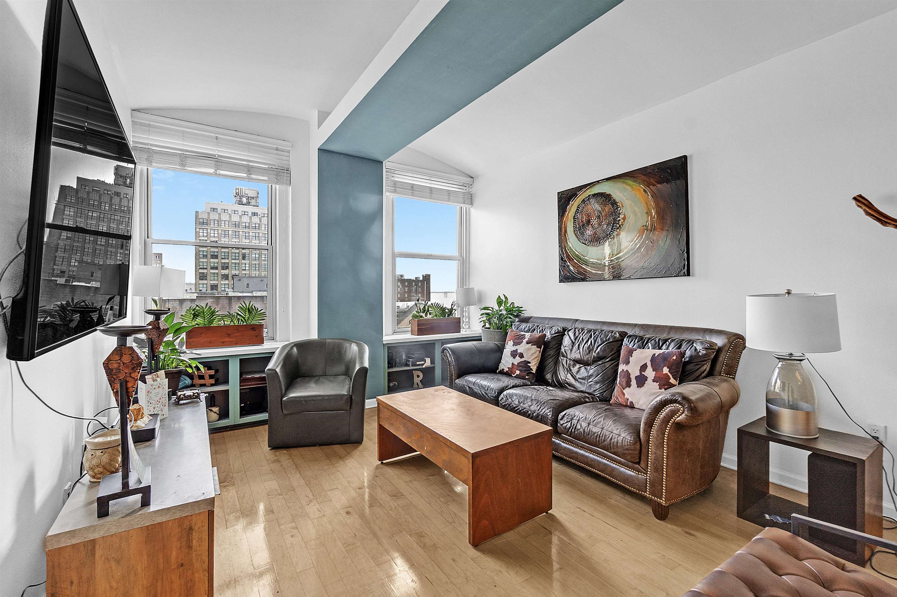 66 Monroe Avenue, Unit 606 Memphis, TN 38103 - Photo 5 of 9 a living room with furniture or couch and a large window