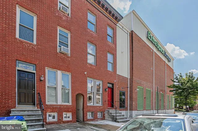 a front view of a building with street