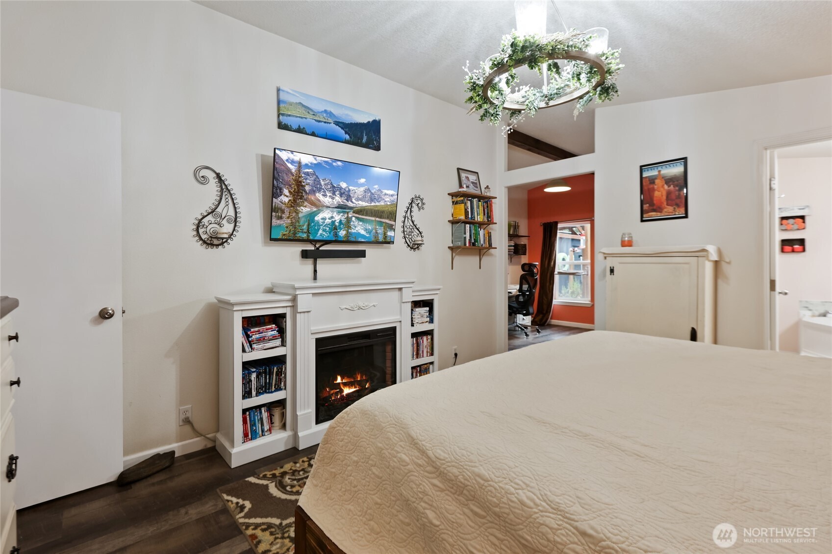 6509 176th Avenue Southwest Longbranch, WA 98351 - Photo 13 of 32 a bedroom with a bed and a fireplace