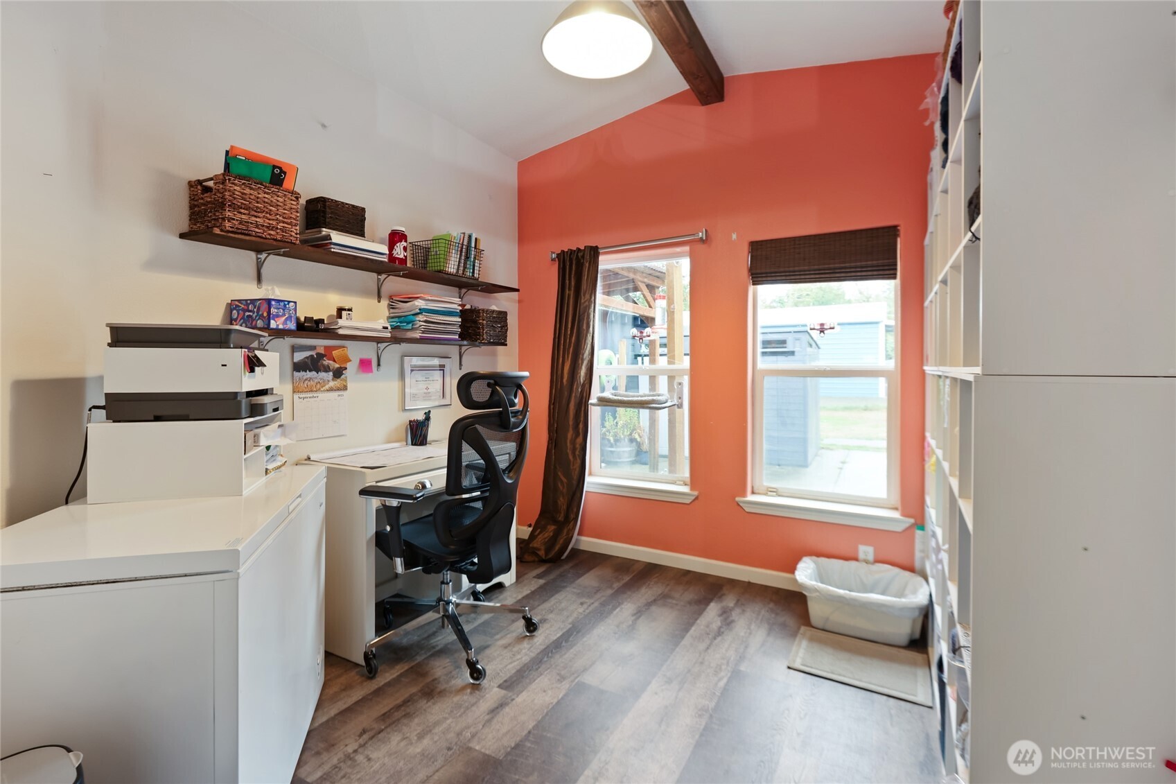 6509 176th Avenue Southwest Longbranch, WA 98351 - Photo 14 of 32 a view of a workspace with furniture and a window
