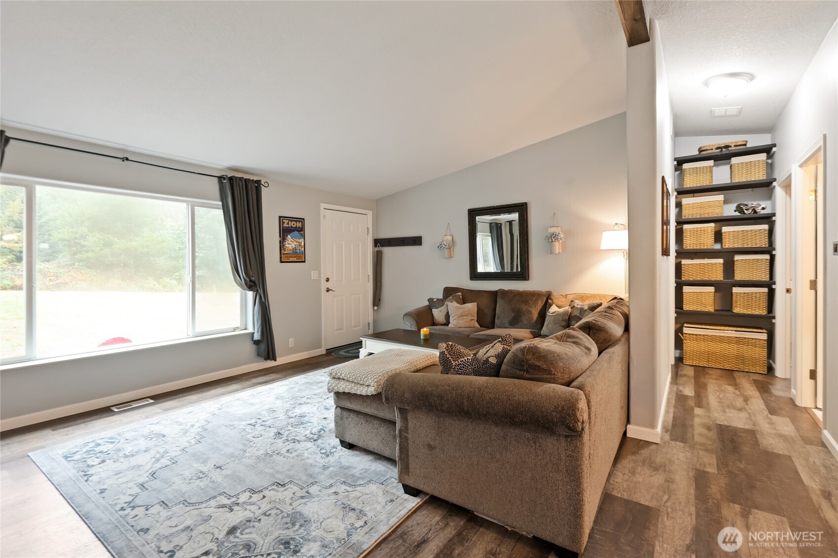 6509 176th Avenue Southwest Longbranch, WA 98351 - Photo 15 of 32 a living room with furniture and a large window