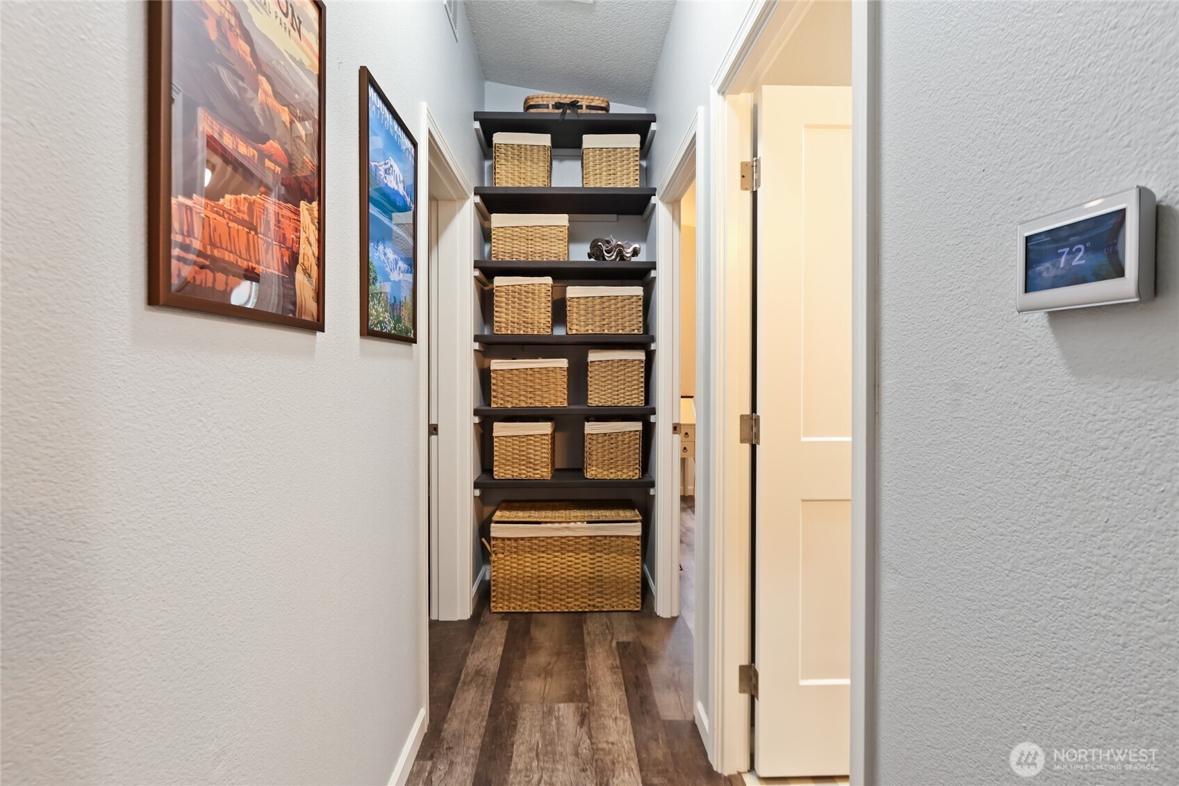 6509 176th Avenue Southwest Longbranch, WA 98351 - Photo 16 of 32 a view of a hallway with wooden floor and entryway