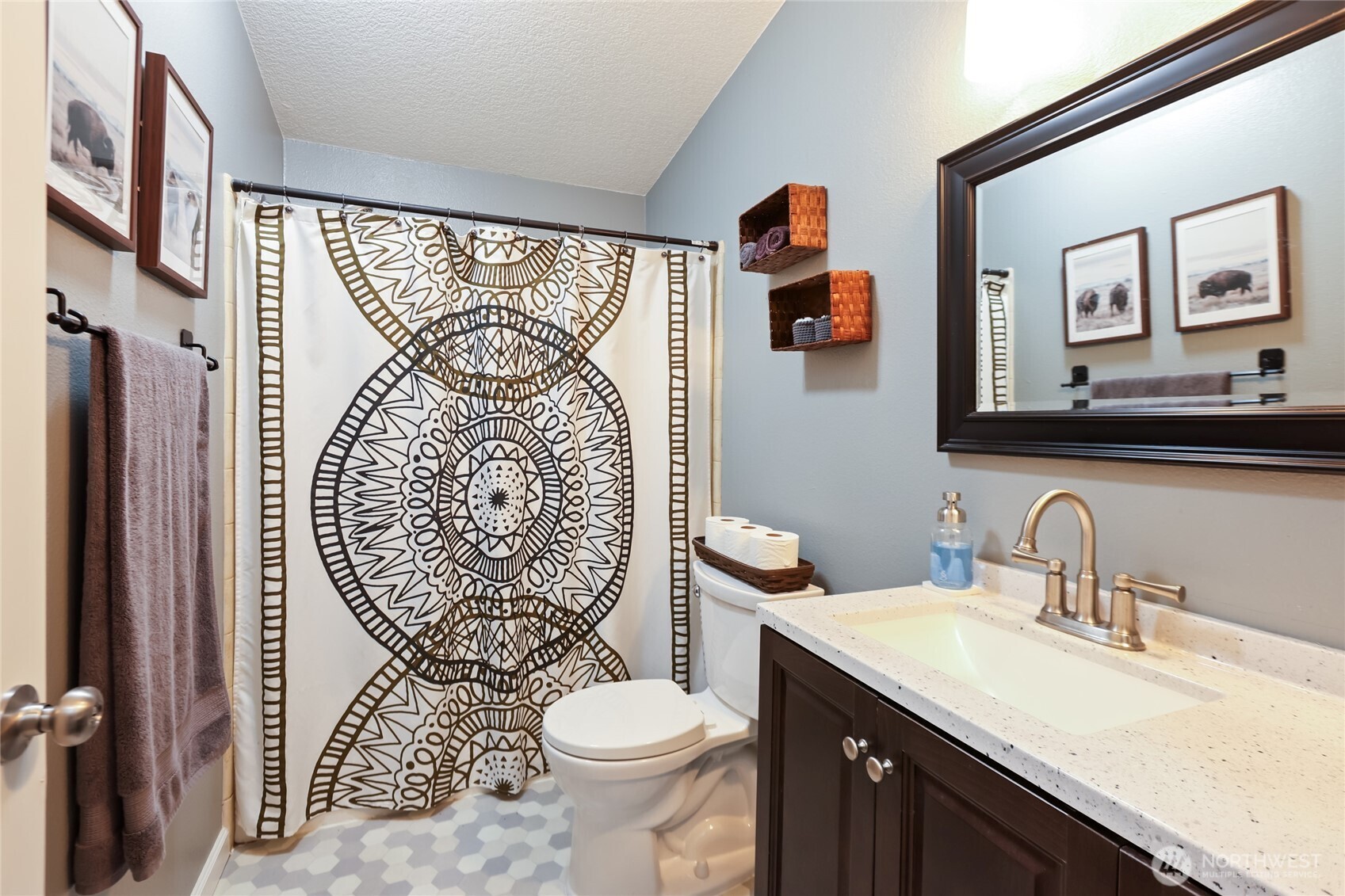 6509 176th Avenue Southwest Longbranch, WA 98351 - Photo 17 of 32 a bathroom with a toilet sink and mirror
