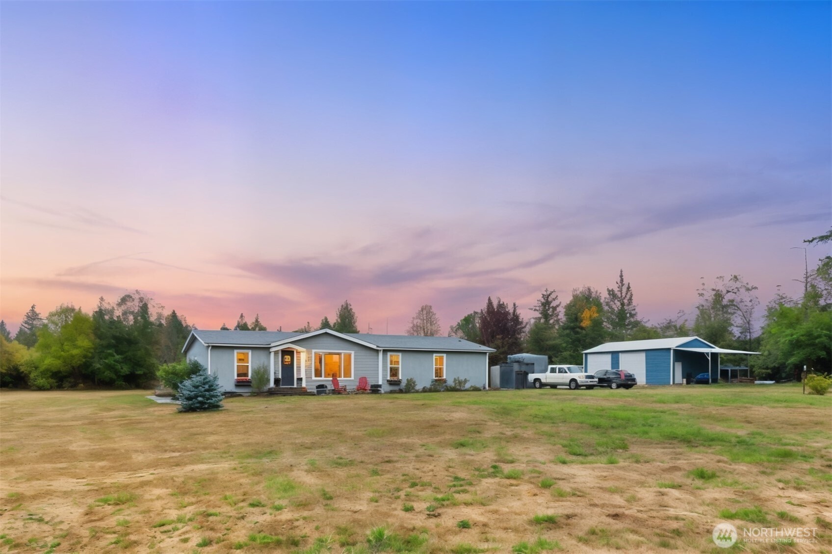 6509 176th Avenue Southwest Longbranch, WA 98351 - Photo 31 of 32 a front view of a house with a garden