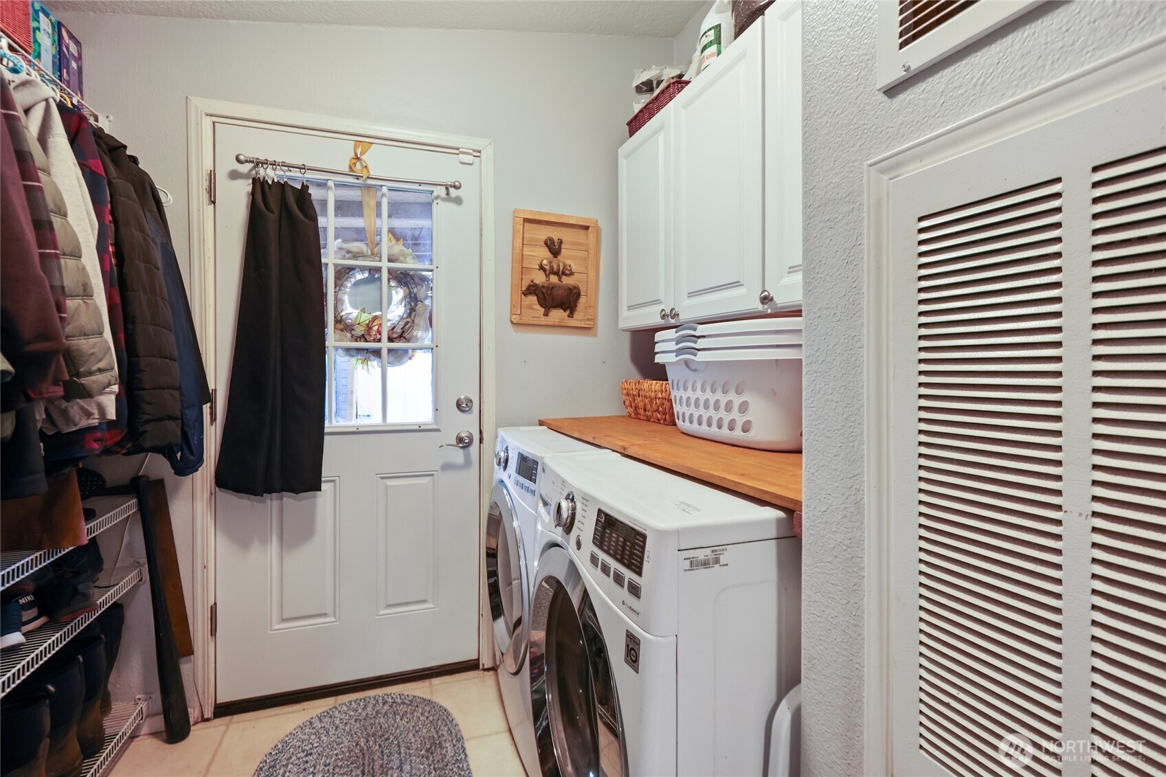 6509 176th Avenue Southwest Longbranch, WA 98351 - Photo 5 of 32 a view of walk in closet with clothes and shoes