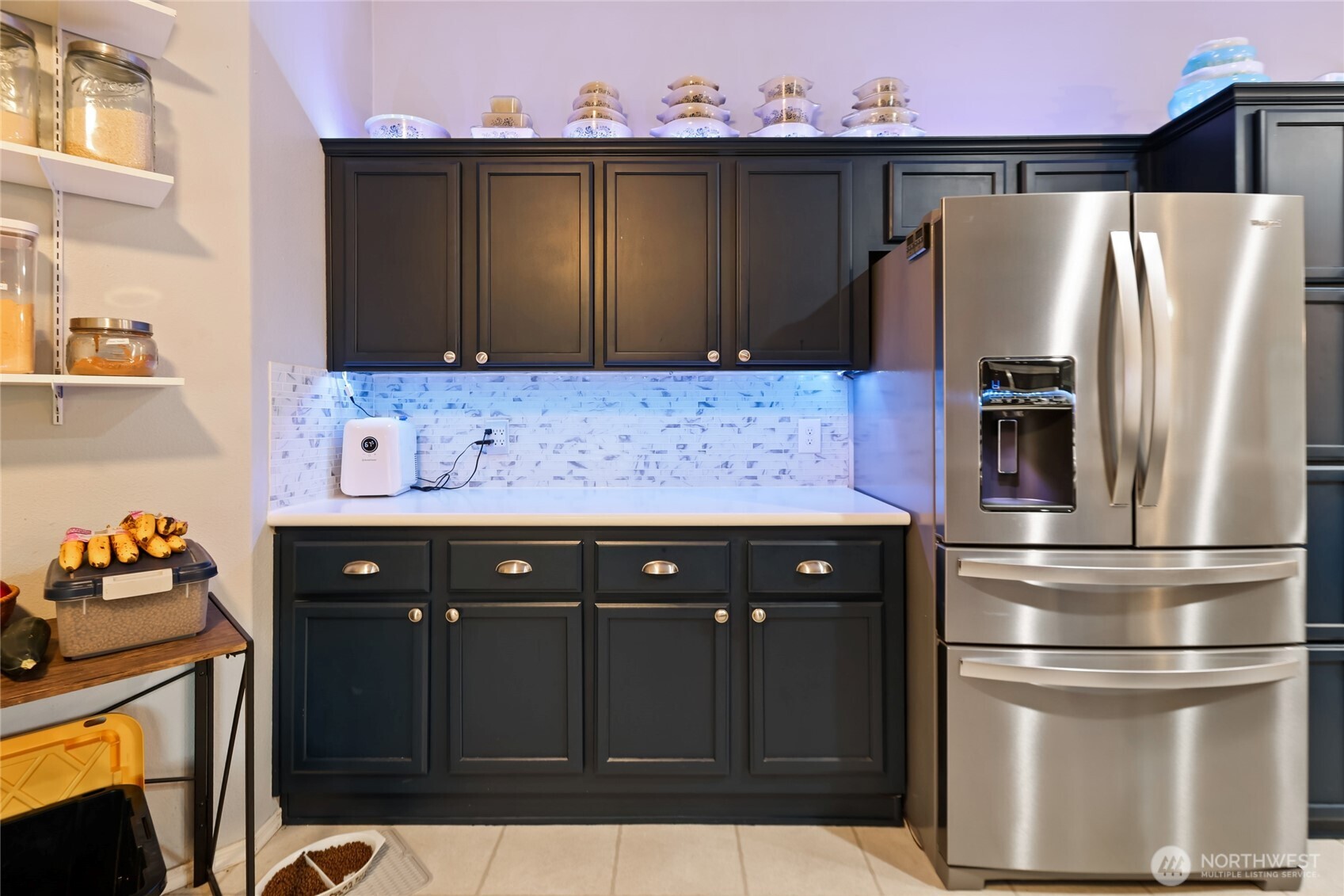 6509 176th Avenue Southwest Longbranch, WA 98351 - Photo 7 of 32 a kitchen with a refrigerator and a stove