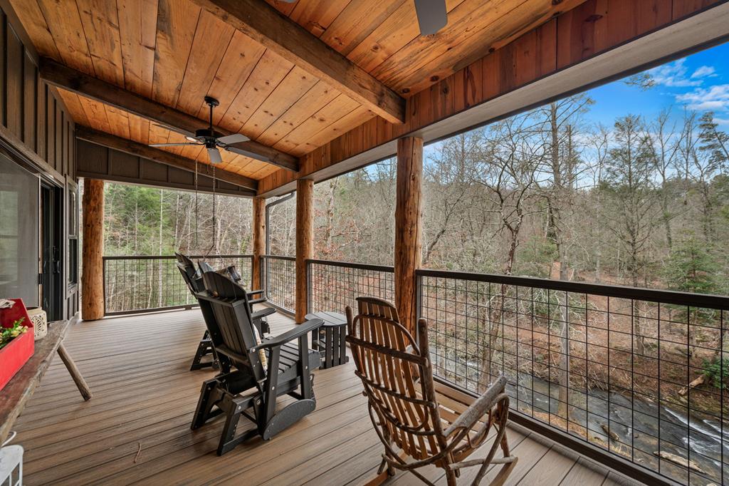164 Waterdance Trail Blue Ridge, GA 30513 - Photo 41 of 97 a view of a chairs and table in the balcony