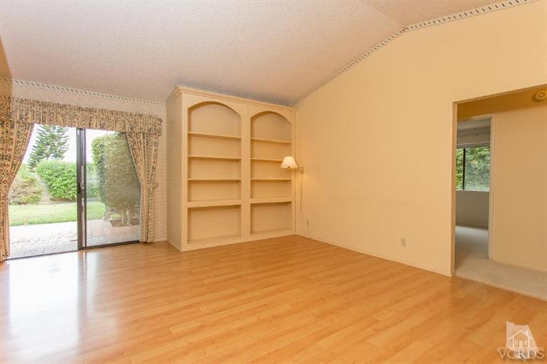 13681 Bear Valley Road Moorpark, CA 93021 - Photo 11 of 33 a view of a room with wooden floor and a large window