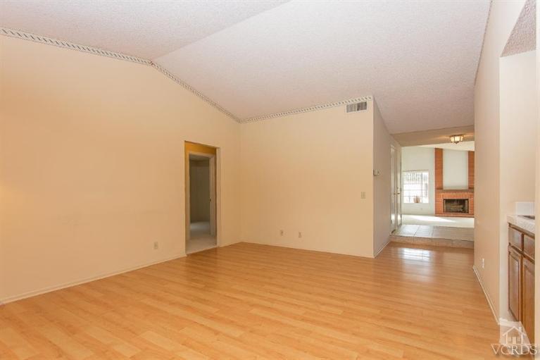 13681 Bear Valley Road Moorpark, CA 93021 - Photo 14 of 33 a view of empty room with wooden floor