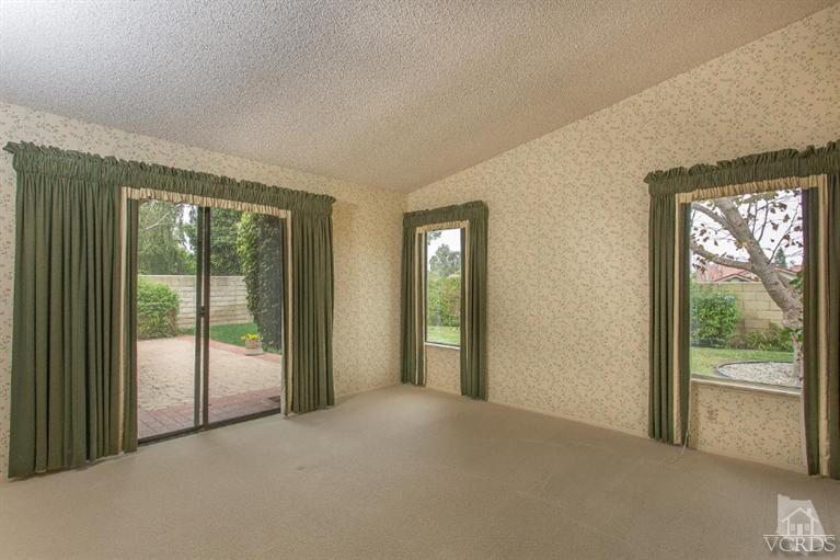 13681 Bear Valley Road Moorpark, CA 93021 - Photo 24 of 33 a view of an empty room with glass door and balcony