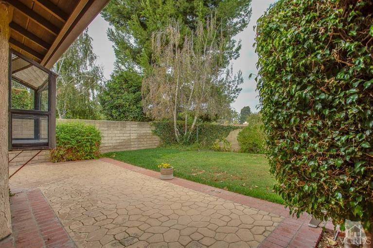 13681 Bear Valley Road Moorpark, CA 93021 - Photo 28 of 33 a view of a backyard with pathway