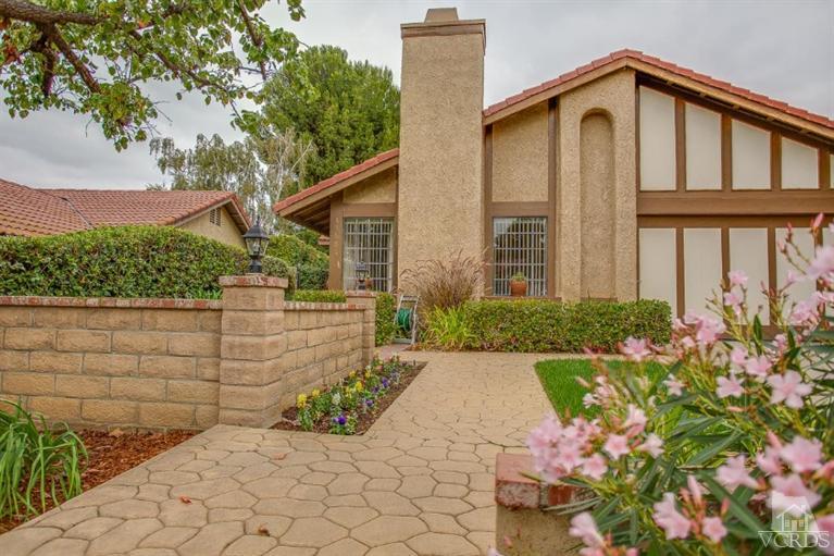 13681 Bear Valley Road Moorpark, CA 93021 - Photo 4 of 33 a front view of a house having yard