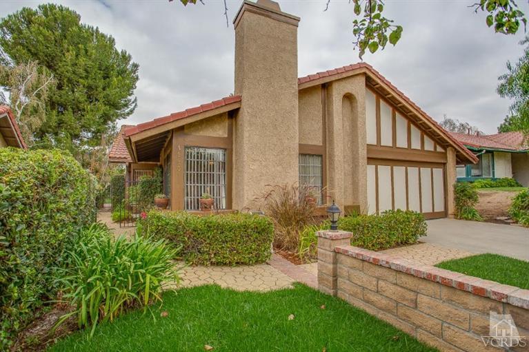 13681 Bear Valley Road Moorpark, CA 93021 - Photo 5 of 33 a front view of a house with garden
