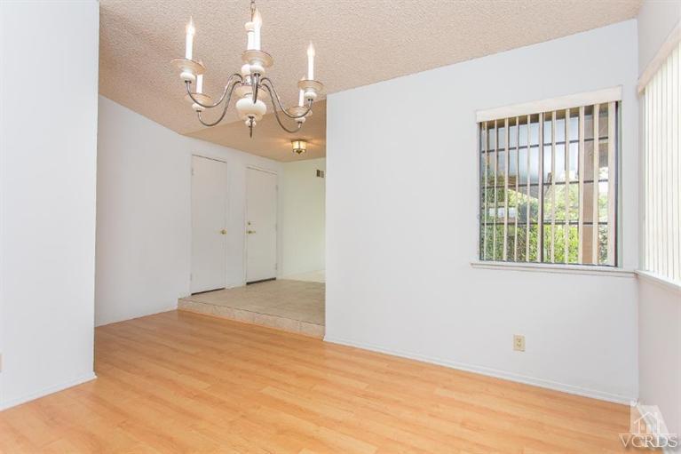 13681 Bear Valley Road Moorpark, CA 93021 - Photo 10 of 33 a view of a chandelier in a room